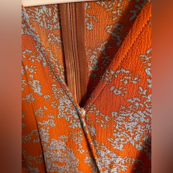 Unbranded women’s floral long sleeve rust colored romper NWOT - Picture 7 of 10